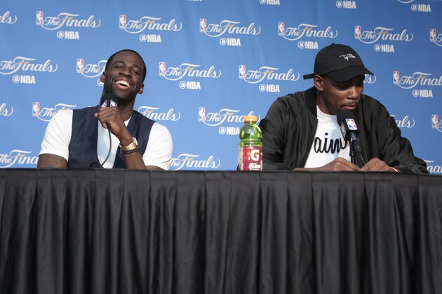OAKLAND, CA - JUNE 4:  Draymond Green #23 and Kevin Durant #35 of the Golden State Warriors discusses with the media Game Two of the 2017 NBA Finals on June 4, 2017 at ORACLE Arena in Oakland, California. NOTE TO USER: User expressly acknowledges and agrees that, by downloading and or using this photograph, User is consenting to the terms and conditions of the Getty Images License Agreement. Mandatory Copyright Notice: Copyright 2017 NBAE (Photo by Jack Arent/NBAE via Getty Images)