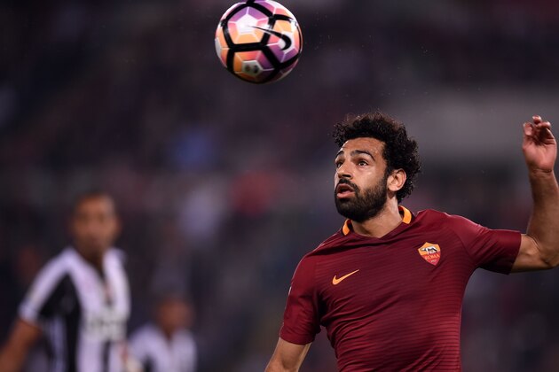 Roma's midfielder from Egypt Mohamed Salah eyes the ball during the Italian Serie A football match Roma vs Juventus, on May 14, 2017 at Rome's Olympic stadium. / AFP PHOTO / FILIPPO MONTEFORTE        (Photo credit should read FILIPPO MONTEFORTE/AFP/Getty Images)