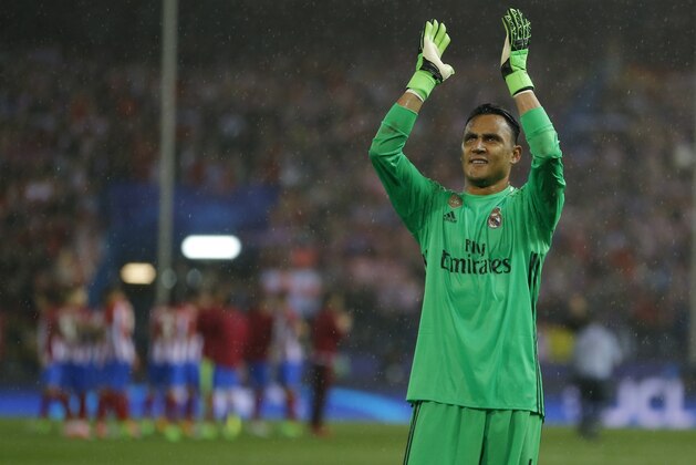 Real Madrid's goalkeeper Keylor Navas waves to his fans after the Champions League semifinal second leg soccer match between Atletico Madrid and Real Madrid at the Vicente Calderon stadium in Madrid, Spain, Wednesday, May 10, 2017. (AP Photo/Francisco Seco)