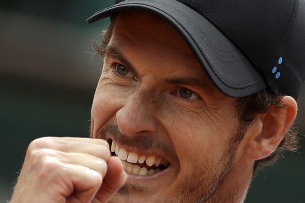 Britain's Andy Murray clenches his fist after scoring a point against Russia Karen Khachanov during their fourth round match of the French Open tennis tournament at the Roland Garros stadium, in Paris, France. Monday, June 5, 2017. (AP Photo/Petr David Josek)