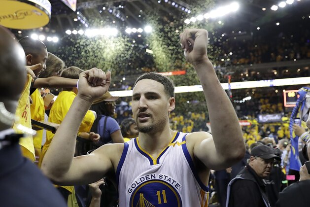 Golden State Warriors guard Klay Thompson (11) walks off the floor after Game 2 of basketball's NBA Finals against the Cleveland Cavaliers in Oakland, Calif., Sunday, June 4, 2017. (AP Photo/Marcio Jose Sanchez)