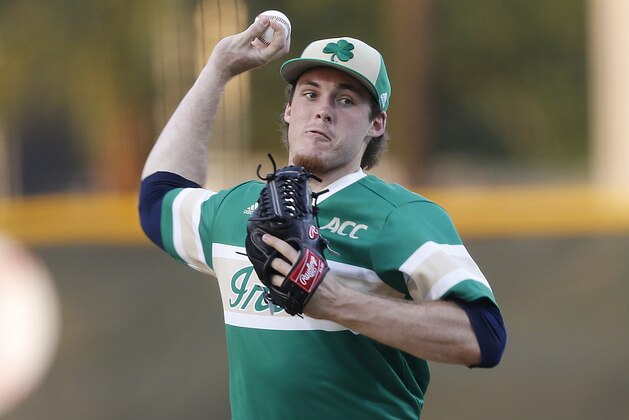 CORAL GABLES, FL - April 21: Pat Connaughton #24 of the Notre Dame Fighting Irish throws the ball against the Miami Hurricanes on April 21, 2014 at Alex Rodriguez Park at Mark Light Field in Coral Gables, Florida. Miami defeated Notre Dame 6-3. (Photo by Joel Auerbach/Getty Images)