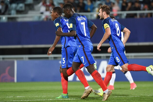 France's Jean-Kevin Augustin (C) celebrates with teammates Issa Diop (L) and Lucas Tousart after scoring during their U-20 World Cup round of 16 football match between France and Italy in Cheonan on June 1, 2017. / AFP PHOTO / KIM DOO-HO        (Photo credit should read KIM DOO-HO/AFP/Getty Images)