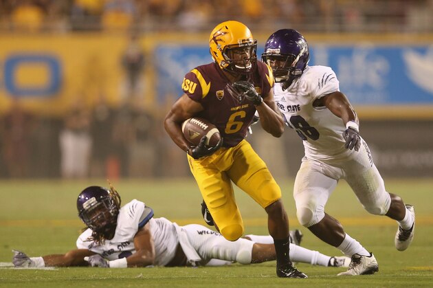 TEMPE, AZ - AUGUST 28:  Wide receiver Cameron Smith #6 of the Arizona State Sun Devils runs with the football after a 14 yard reception against the Weber State Wildcats during the second quarter of the college football game at Sun Devil Stadium on August 28, 2014 in Tempe, Arizona. The Sun Devils defeated the Wildcats 45-14  (Photo by Christian Petersen/Getty Images)
