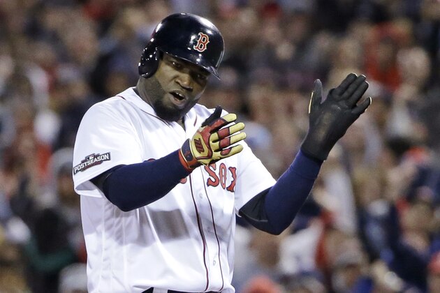 Boston Red Sox designated hitter David Ortiz encourages the crowd after drawing a walk during the eighth inning in Game 3 of baseball's American League Division Series against the Cleveland Indians, Monday, Oct. 10, 2016, in Boston. (AP Photo/Elise Amendola)