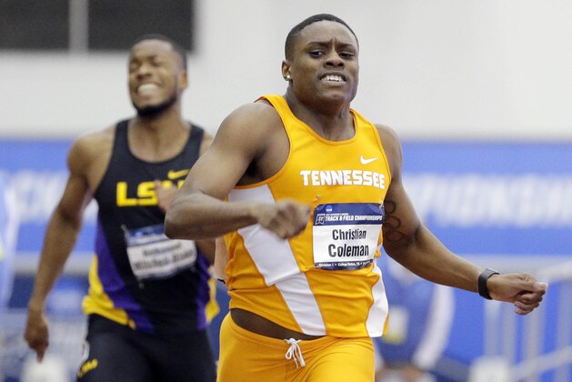 LSU's Nethaneel Mitchell-Blake, left, reacts after losing the mens' 200-meter dash to Tennesee's Christian Coleman, right, during the NCAA college indoor track and field championships Saturday, March 11, 2017, in College Station, Texas. (AP Photo/Michael Wyke)