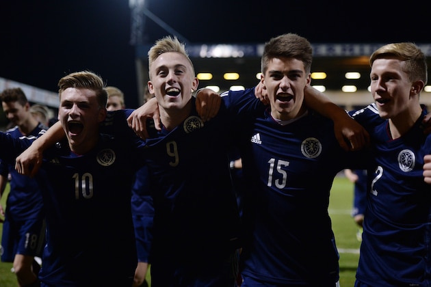 KIRCKALDY,  SCOTLAND - NOVEMBER 29 : (L-R)   MacKenzie Heaney ,Calvin Miller, Ben Stirling and Ross McCrorie of Scotland U16s celebrate their teams victory over England during the Sky Sports Victory Shield match between Scotland U16 and England U16 on November 29, 2013 in Kirckaldy Scotland.  (Photo by Mark Runnacles/Getty Images)