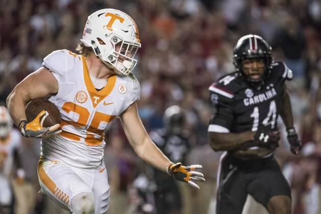 Tennessee wide receiver Josh Smith (25) picks up yardage during the second half of an NCAA college football game against South Carolina on Saturday, Oct. 29, 2016, in Columbia, S.C. South Carolina defeated Tennessee 24-21. (AP Photo/Sean Rayford)
