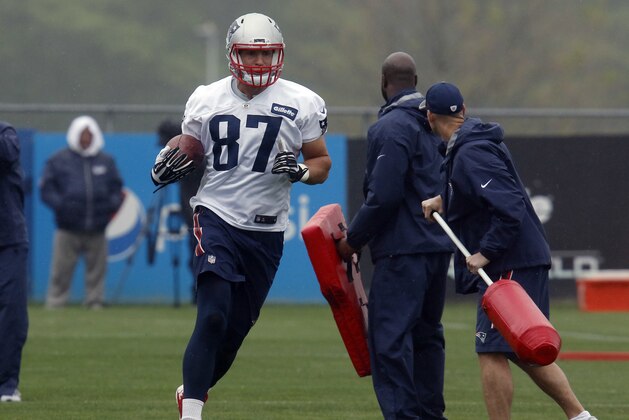 New England Patriots tight end Rob Gronkowski runs through a drill during an NFL football organized team activities practice Thursday, May 25, 2017, in Foxborough, Mass. (AP Photo/Bill Sikes)