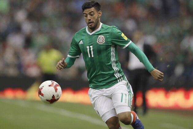 Mexico's Carlos Vela drives the ball during a 2018 Russia World Cup qualifying soccer match between Mexico and Costa Rica at Azteca Stadium in Mexico City, Friday, March 24, 2017. (AP Photo/Rebecca Blackwell)