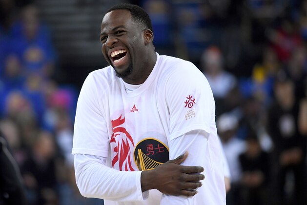 OAKLAND, CA - FEBRUARY 08:  Draymond Green #23 of the Golden State Warriors laughing while warming up prior to the start of an NBA basketball game against the Chicago Bulls at ORACLE Arena on February 8, 2017 in Oakland, California. NOTE TO USER: User expressly acknowledges and agrees that, by downloading and or using this photograph, User is consenting to the terms and conditions of the Getty Images License Agreement.  (Photo by Thearon W. Henderson/Getty Images)