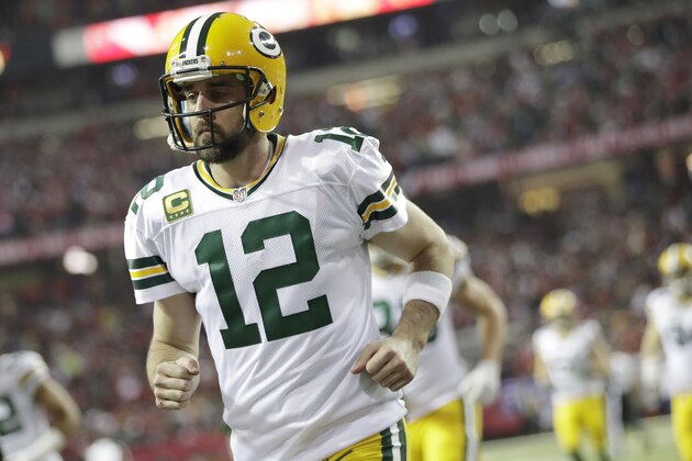 Green Bay Packers' Aaron Rodgers heads to the locker room after the first half of the NFL football NFC championship game against the Atlanta Falcons, Sunday, Jan. 22, 2017, in Atlanta. (AP Photo/David Goldman)