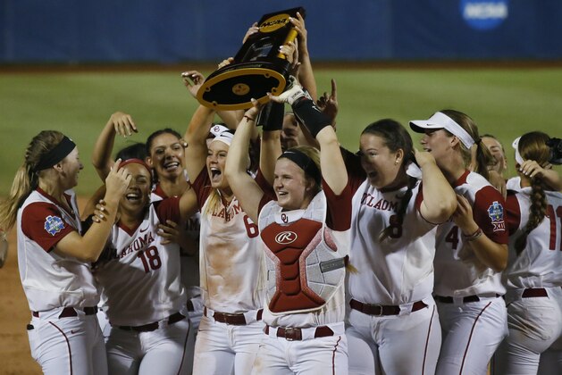The Oklahoma team celebrates after defeating Florida in the second game of the best-of-three championship series in the NCAA Women's College World Series in Oklahoma City, Tuesday, June 6, 2017. Oklahoma won the game 5-4, and the championship. (AP Photo/Sue Ogrocki)