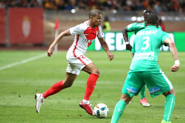 MONACO, MONACO - MAY 17: Kylian Mbappe of Monaco in action during the French Ligue 1 match between AS Monaco and AS Saint-Etienne (ASSE) at Stade Louis II on May 17, 2017 in Monaco, Monaco. (Photo by Jean Catuffe/Getty Images)