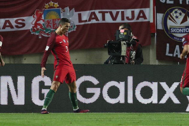 FARO, PORTUGAL - NOVEMBER 13: Portugal's forward Cristiano Ronaldo from Portugal celebrates scoring Portugal's first goal during the Portugal v Latvia - FIFA 2018 World Cup Qualifier match at Estadio do Algarve on November 13, 2016 in Faro, Portugal.  (Photo by Carlos Rodrigues/Getty Images)
