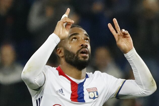 Lyon's Alexandre Lacazette celebrates scoring during the second leg semi final soccer match between Olympique Lyon and Ajax in the Stade de Lyon, Decines, France, Thursday, May 11, 2017. (AP Photo/Laurent Cipriani)