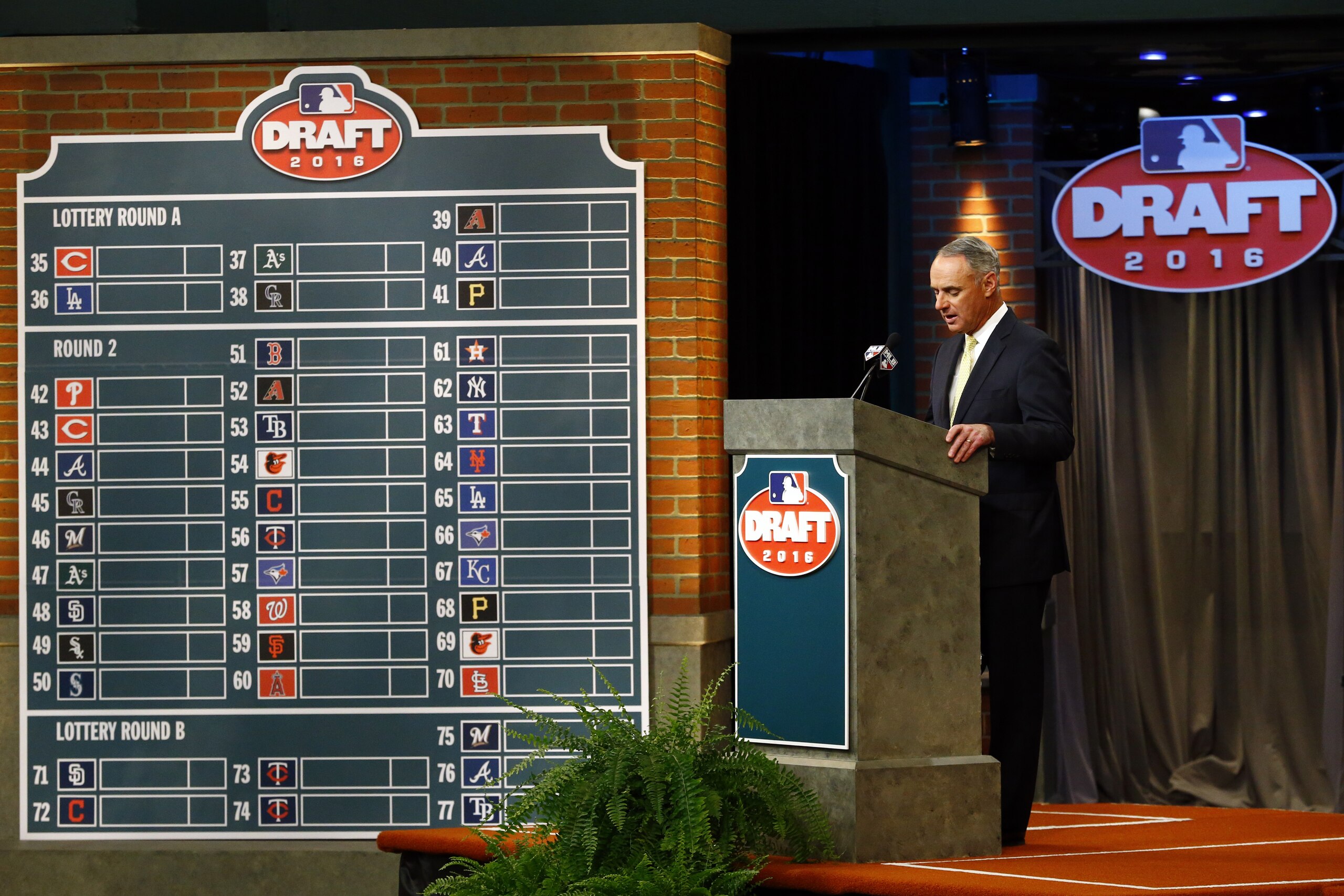 Commissioner Rob Manfred speaks during the Major League Baseball draft, Thursday, June 9, 2016, in Secaucus, N.J. (AP Photo/Julio Cortez)