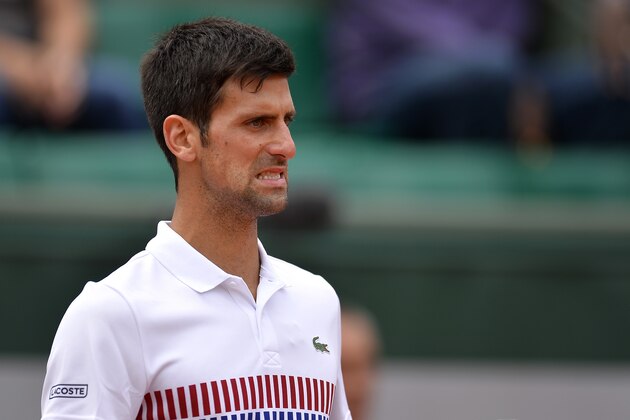 PARIS, FRANCE - JUNE 07:  Novak Djokovic of Serbia reacts during the men's singles quarterfinal match against Dominic Thiem of Austria  on day eleven of the 2017 French Open at Roland Garros on June 7, 2017 in Paris, France.  (Photo by Aurelien Meunier/Getty Images)