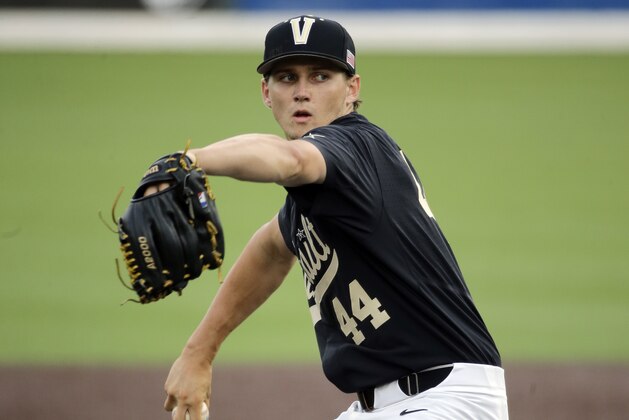 Vanderbilt starter Kyle Wright pitches against Washington in the first inning of an NCAA college baseball regional tournament game Saturday, June 4, 2016, in Nashville, Tenn. (AP Photo/Mark Humphrey)