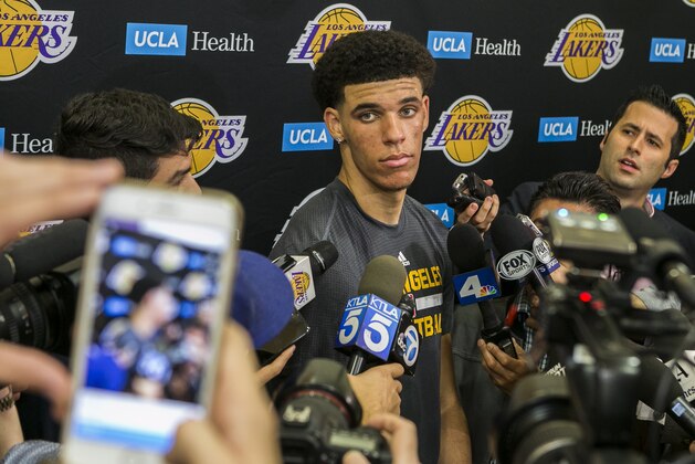 University of California Los Angeles guard Lonzo Ball takes questions from the media after a closed Los Angeles Lakes pre-draft workout in El Segundo, Calif., Wednesday, Jun. 7, 2017. (AP Photo/Damian Dovarganes)