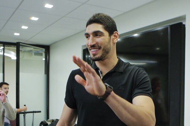 NEW YORK, NY - MAY 22: Turkish NBA Player Enes Kanter leaves after speaking to the media during a news conference about his detention at a Romanian airport on May 22, 2017 in New York City. Kanter returned to the U.S. after being detained for several hours at a Romanian airport following statements he made criticizing Turkey's president Recep Tayyip Erdogan. (Photo by Eduardo Munoz Alvarez/Getty Images) NEW YORK, NY - MAY 22: Turkish NBA Player Enes Kanter leaves after speaking to the media during a news conference about his detention at a Romanian airport on May 22, 2017 in New York City. Kanter returned to the U.S. after being detained for several hours at a Romanian airport following statements he made criticizing Turkey's president Recep Tayyip Erdogan. (Photo by Eduardo Munoz Alvarez/Getty Images)