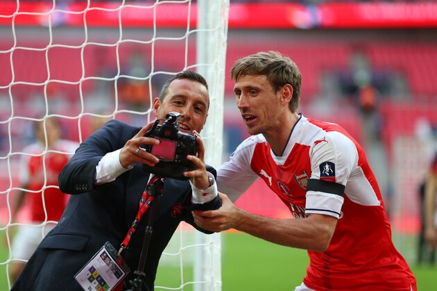 LONDON, ENGLAND - MAY 27: Santi Cazorla of Arsenal and Nacho Monreal of Arsenal take a selfie on a photographers remote camera after the Emirates FA Cup Final match between Arsenal and Chelsea at Wembley Stadium on May 27, 2017 in London, England. (Photo by Catherine Ivill - AMA/Getty Images)