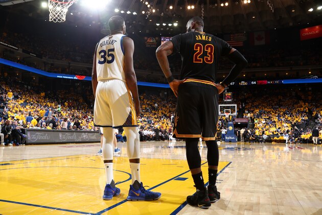 OAKLAND, CA - JUNE 4:  Kevin Durant #35 of the Golden State Warriors and LeBron James #23 of the Cleveland Cavaliers during Game Two of the 2017 NBA Finals on June 4, 2017 at ORACLE Arena in Oakland, California. NOTE TO USER: User expressly acknowledges and agrees that, by downloading and or using this photograph, user is consenting to the terms and conditions of Getty Images License Agreement. Mandatory Copyright Notice: Copyright 2017 NBAE (Photo by Nathaniel S. Butler/NBAE via Getty Images)
