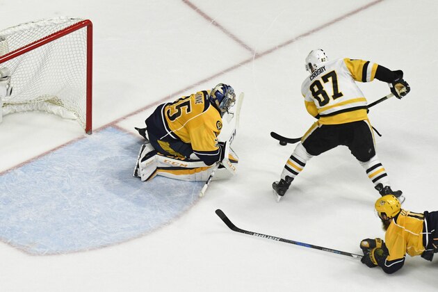 Jun 5, 2017; Nashville, TN, USA; Nashville Predators goalie Pekka Rinne (35) makes a save against Pittsburgh Penguins center Sidney Crosby (87) in game four of the 2017 Stanley Cup Final at Bridgestone Arena. Mandatory Credit: Christopher Hanewinckel-USA TODAY Sports