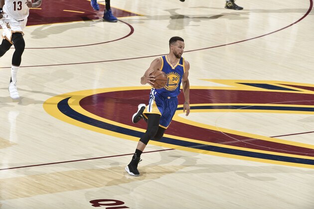 CLEVELAND, OH - JUNE 07:  Stephen Curry #30 of the Golden State Warriors dribbles the ball up court against the Cleveland Cavaliers in Game Three of the 2017 NBA Finals on June 7, 2017 at Quicken Loans Arena in Cleveland, Ohio. NOTE TO USER: User expressly acknowledges and agrees that, by downloading and or using this photograph, user is consenting to the terms and conditions of Getty Images License Agreement. Mandatory Copyright Notice: Copyright 2017 NBAE (Photo by David Liam Kyle/NBAE via Getty Images)