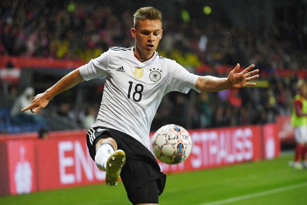 Germany's defender Joshua Kimmich plays the ball during the friendly football match of Denmark vs Germany in Copenhagen, Denmark, on June 6, 2017. / AFP PHOTO / PATRIK STOLLARZ        (Photo credit should read PATRIK STOLLARZ/AFP/Getty Images)