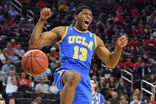 LAS VEGAS, NV - MARCH 10:  Ike Anigbogu #13 of the UCLA Bruins reacts after dunking against the Arizona Wildcats during a semifinal game of the Pac-12 Basketball Tournament at T-Mobile Arena on March 10, 2017 in Las Vegas, Nevada. Arizona won 86-75.  (Photo by Ethan Miller/Getty Images)