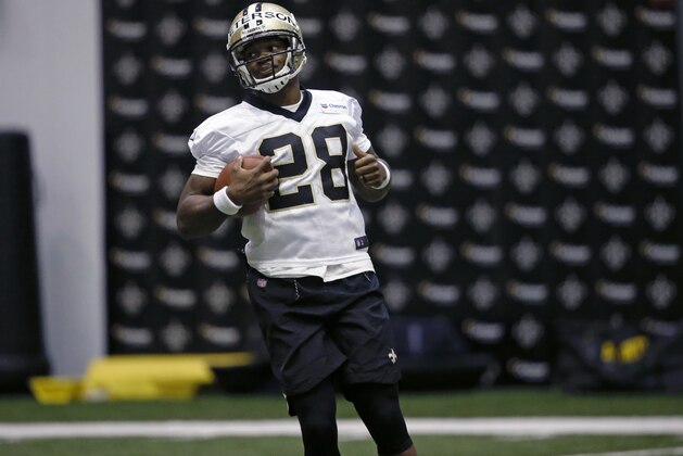 New Orleans Saints running back Adrian Peterson (28) goes through drills during an NFL football practice in Metairie, La., Thursday, June 1, 2017. (AP Photo/Gerald Herbert)