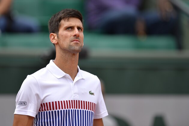 PARIS, FRANCE - JUNE 07: Novak Djokovic of Serbia reacts during the men's singles quarterfinal match against Dominic Thiem of Austria on day eleven of the 2017 French Open at Roland Garros on June 7, 2017 in Paris, France. (Photo by Aurelien Meunier/Getty Images) PARIS, FRANCE - JUNE 07: Novak Djokovic of Serbia reacts during the men's singles quarterfinal match against Dominic Thiem of Austria on day eleven of the 2017 French Open at Roland Garros on June 7, 2017 in Paris, France. (Photo by Aurelien Meunier/Getty Images)