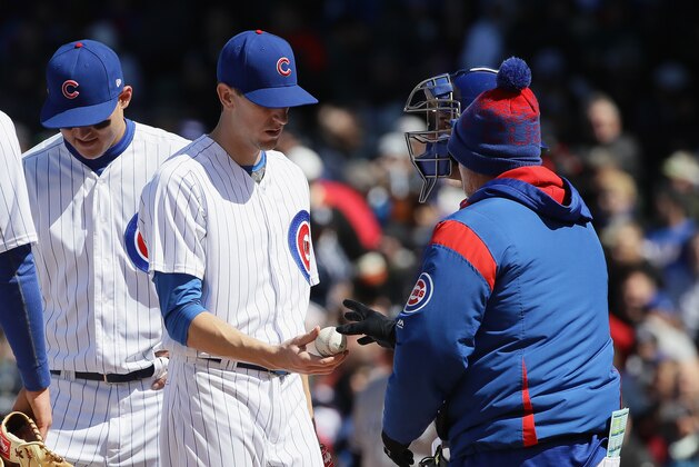 CHICAGO, IL - MAY 05:  Starting pitcher Kyle Hendricks #28 of the Chicago Cubs is taken out of the game by manager Joe Maddon #70 in the 6th inning against the New York Yankees at Wrigley Field on May 5, 2017 in Chicago, Illinois.  (Photo by Jonathan Daniel/Getty Images)