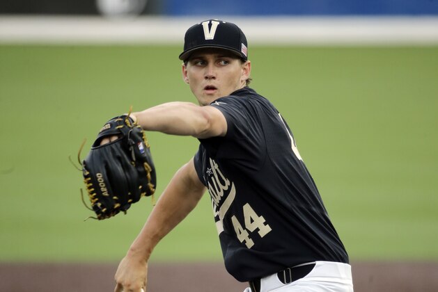 Vanderbilt starter Kyle Wright pitches against Washington in the first inning of an NCAA college baseball regional tournament game Saturday, June 4, 2016, in Nashville, Tenn. (AP Photo/Mark Humphrey)