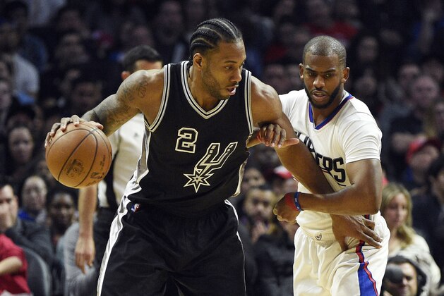 Feb 24, 2017; Los Angeles, CA, USA; San Antonio Spurs forward Kawhi Leonard (2) posts up on Los Angeles Clippers guard Chris Paul (3) during the second quarter at Staples Center. Mandatory Credit: Kelvin Kuo-USA TODAY Sports