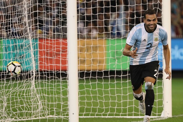 MELBOURNE, AUSTRALIA - JUNE 09:  Gabriel Mercado of Argentina celebrates after scoring a goal during the Brazil Global Tour match between Brazil and Argentina at Melbourne Cricket Ground on June 9, 2017 in Melbourne, Australia.  (Photo by Robert Cianflone/Getty Images)