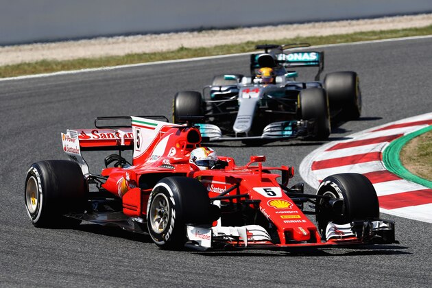 MONTMELO, SPAIN - MAY 14: Sebastian Vettel of Germany driving the (5) Scuderia Ferrari SF70H leads Lewis Hamilton of Great Britain driving the (44) Mercedes AMG Petronas F1 Team Mercedes F1 WO8 on track during the Spanish Formula One Grand Prix at Circuit de Catalunya on May 14, 2017 in Montmelo, Spain.  (Photo by Mark Thompson/Getty Images)