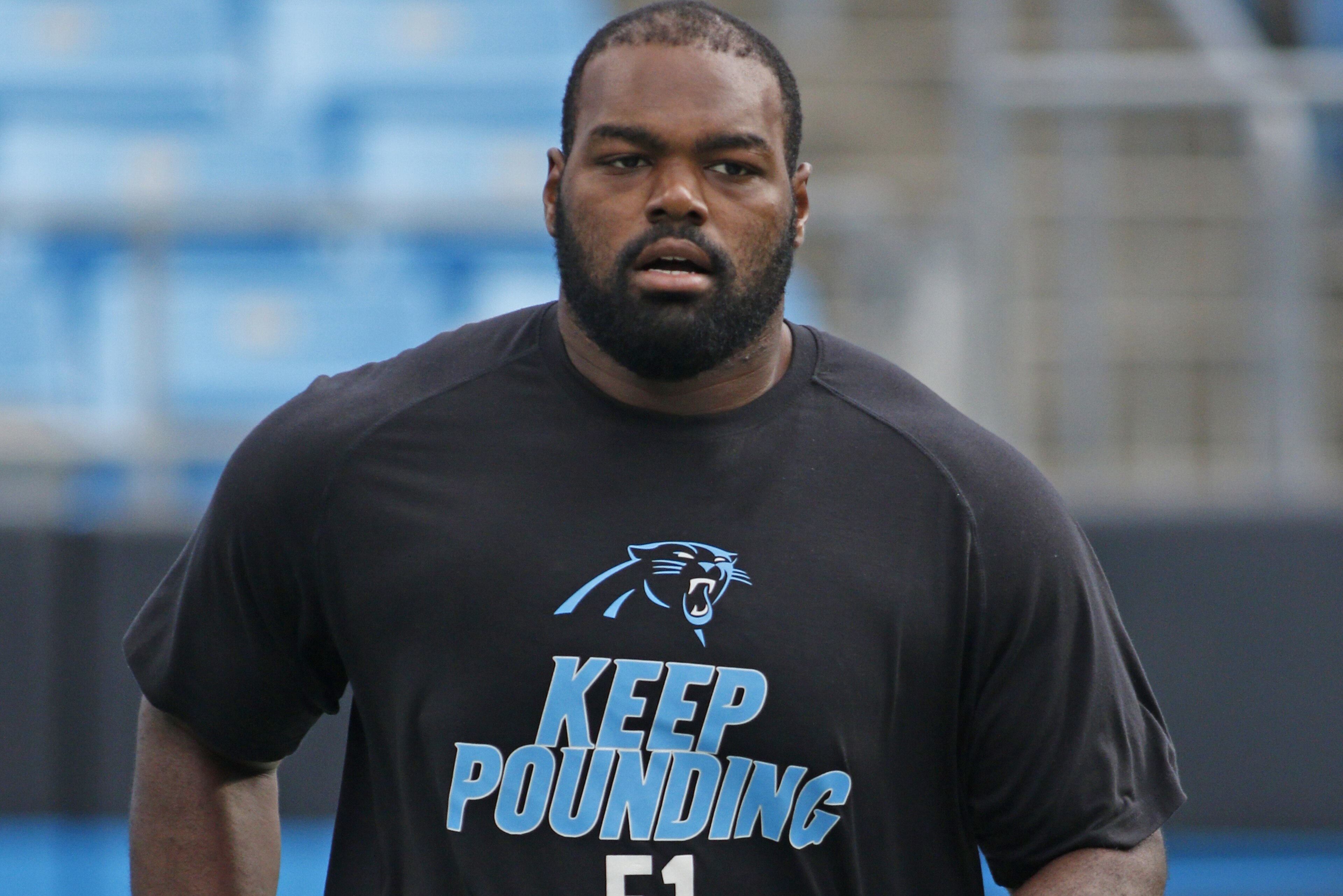 Carolina Panthers' Michael Oher warms up before an NFL football game in Charlotte, N.C., Saturday, Aug. 22, 2015. (AP Photo/Bob Leverone)