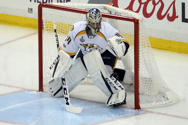 Jun 8, 2017; Pittsburgh, PA, USA; Nashville Predators goalie Juuse Saros (74) takes over in goal for goalie Pekka Rinne (35) against the Pittsburgh Penguins during the second period in game five of the 2017 Stanley Cup Final at PPG PAINTS Arena. Mandatory Credit: Charles LeClaire-USA TODAY Sports