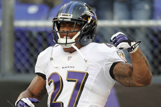 Baltimore Ravens running back Ray Rice runs onto the field after being introduced in the first half of an NFL preseason football game against the San Francisco 49ers, Thursday, Aug. 7, 2014, in Baltimore. (AP Photo/Nick Wass)