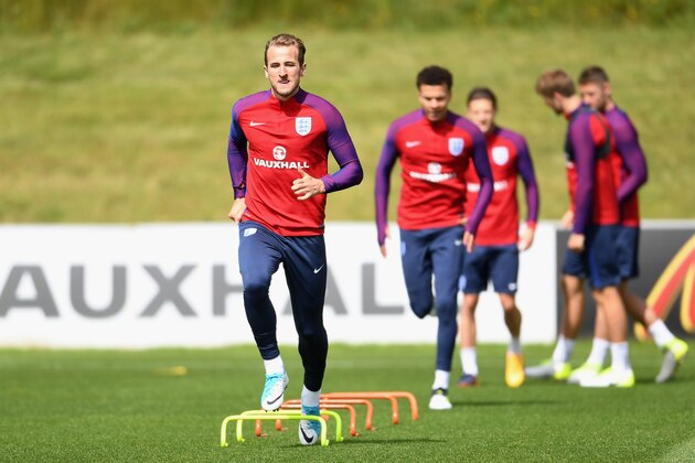 BURTON-UPON-TRENT, ENGLAND - JUNE 09:  Harry Kane performs a drill with team mates during an England training session on the eve of their FIFA World Cup qualifier against Scotland at St Georges Park on June 9, 2017 in Burton-upon-Trent, England.  (Photo by Laurence Griffiths/Getty Images)