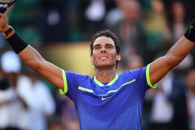 Spain's Rafael Nadal celebrates after winning against Austria's Dominic Thiem their semifinal tennis match at the Roland Garros 2017 French Open on June 9, 2017 in Paris.  / AFP PHOTO / GABRIEL BOUYS        (Photo credit should read GABRIEL BOUYS/AFP/Getty Images)