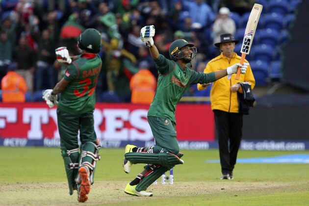 Bangladesh's Mahmudullah (R) celebrates their victory in the ICC Champions Trophy match between New Zealand and Bangladesh in Cardiff on June 9, 2017.
Bangladesh beat New Zealand by five wickets in their Champions Trophy Group A match. / AFP PHOTO / Geoff CADDICK / RESTRICTED TO EDITORIAL USE        (Photo credit should read GEOFF CADDICK/AFP/Getty Images)