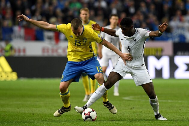 France's midfielder Paul Pogba vies with Sweden's midfielder Jakob Johansson (L)  during the FIFA World Cup 2018 qualification football match between Sweden and France in Solna, Sweden, on June 9, 2017. / AFP PHOTO / FRANCK FIFE        (Photo credit should read FRANCK FIFE/AFP/Getty Images)