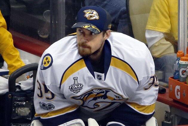 Nashville Predators goalie Pekka Rinne watches from the bench during the second period in Game 5 of the team's NHL hockey Stanley Cup Final against the Pittsburgh Penguins, Thursday, June 8, 2017, in Pittsburgh. (AP Photo/Gene J. Puskar)
