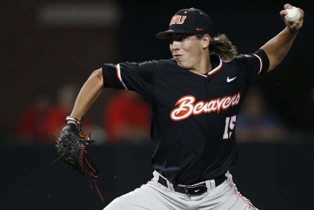 Oregon State's Luke Heimlich pitches to a Dallas Baptist batter during the third inning of an NCAA college baseball tournament regional game Sunday, May 31, 2015, in Dallas. (AP Photo/Ralph Lauer)
