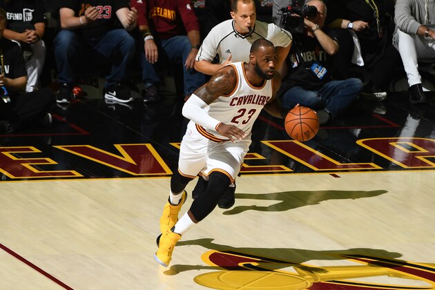 CLEVELAND, OH - JUNE 09:  LeBron James #23 of the Cleveland Cavaliers takes the ball up court Golden State Warriors in Game Four of the 2017 NBA Finals on June 9, 2017 at Quicken Loans Arena in Cleveland, Ohio. NOTE TO USER: User expressly acknowledges and agrees that, by downloading and or using this photograph, user is consenting to the terms and conditions of Getty Images License Agreement. Mandatory Copyright Notice: Copyright 2017 NBAE (Photo by Garrett Ellwood/NBAE via Getty Images)