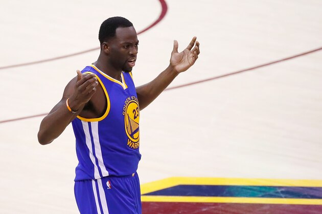 CLEVELAND, OH - JUNE 09:  Draymond Green #23 of the Golden State Warriors reacts after a foul call in the first quarter against the Cleveland Cavaliers in Game 4 of the 2017 NBA Finals at Quicken Loans Arena on June 9, 2017 in Cleveland, Ohio. NOTE TO USER: User expressly acknowledges and agrees that, by downloading and or using this photograph, User is consenting to the terms and conditions of the Getty Images License Agreement.  (Photo by Gregory Shamus/Getty Images)