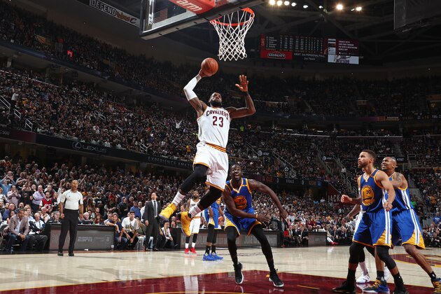 CLEVELAND, OH - JUNE 09:  LeBron James #23 of the Cleveland Cavaliers dunks the ball against the Golden State Warriors in Game Four of the 2017 NBA Finals on June 9, 2017 at Quicken Loans Arena in Cleveland, Ohio. NOTE TO USER: User expressly acknowledges and agrees that, by downloading and or using this photograph, user is consenting to the terms and conditions of Getty Images License Agreement. Mandatory Copyright Notice: Copyright 2017 NBAE (Photo by Nathaniel S. Butler/NBAE via Getty Images)